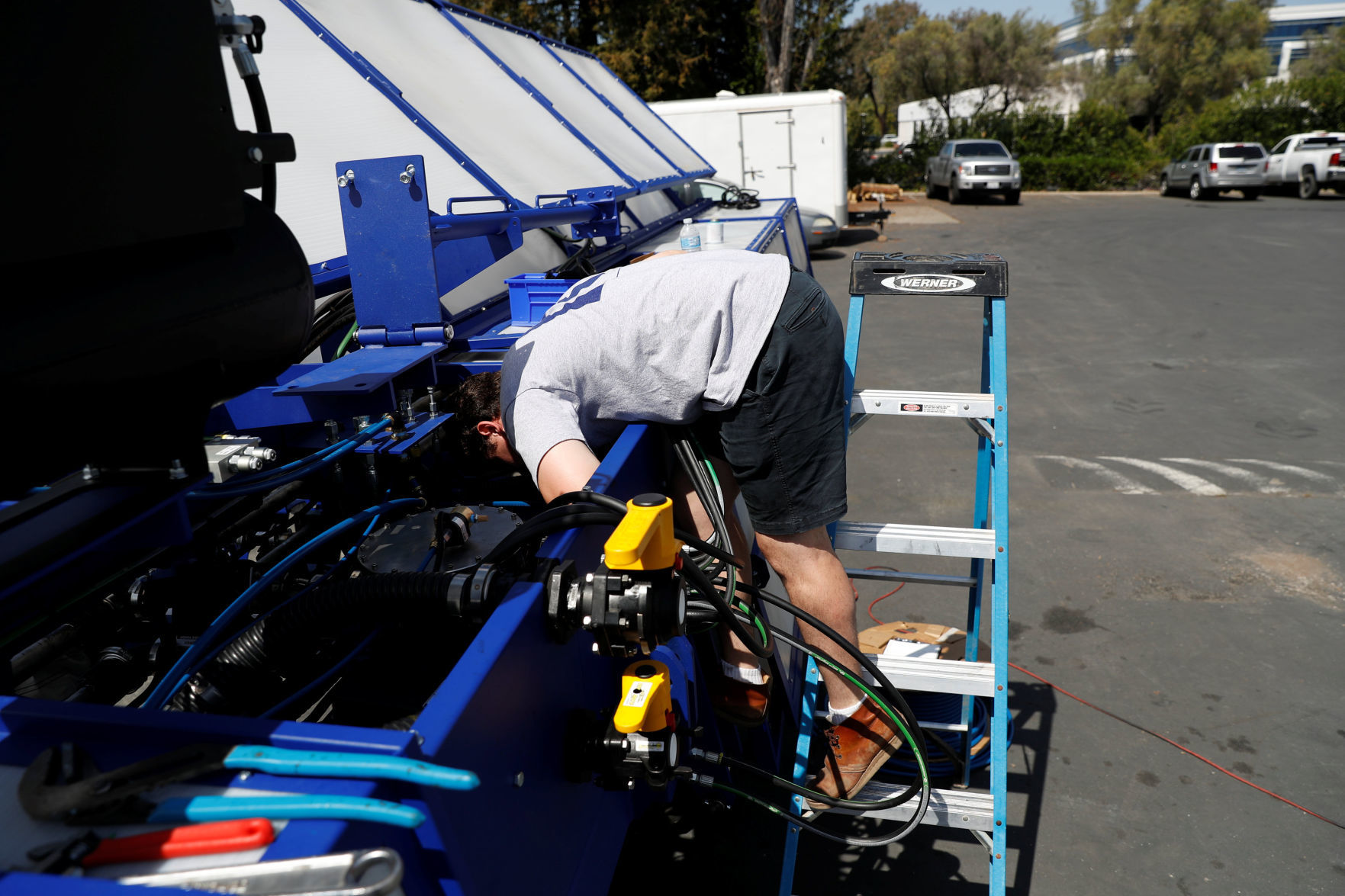 An engineer assembles a Blue River Technology See & Spray agricultural machine in Sunnyvale, California